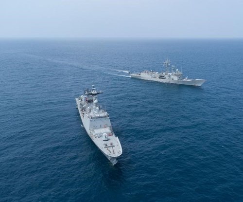 ATALANTA flagship SANTA MARIA crewmember briefing to a Djiboutian Navy trainee